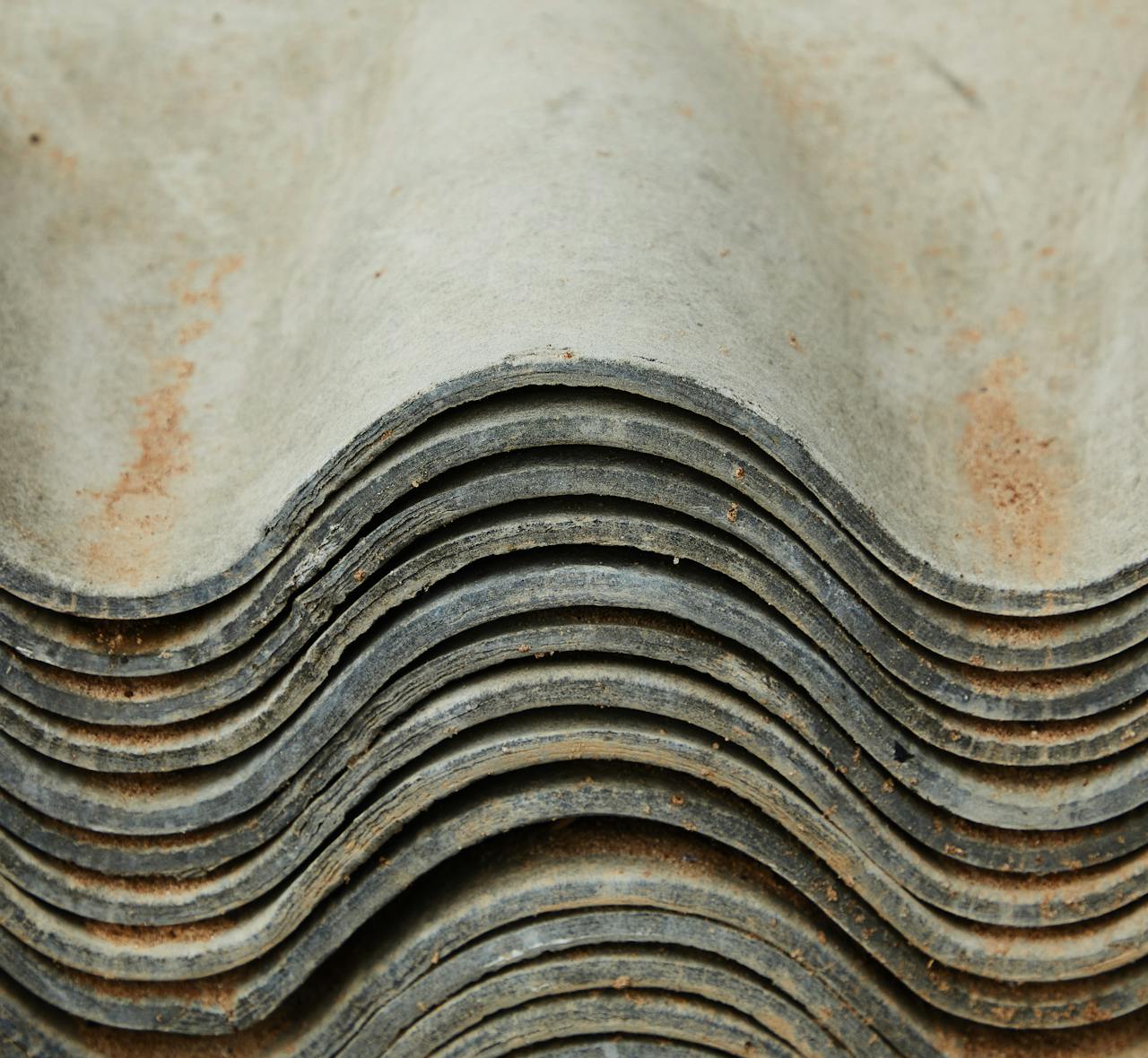 The Art of Drawing Readers In: Your attractive post title goes here Background of heap of aged rough shabby slate for repairing roof of house